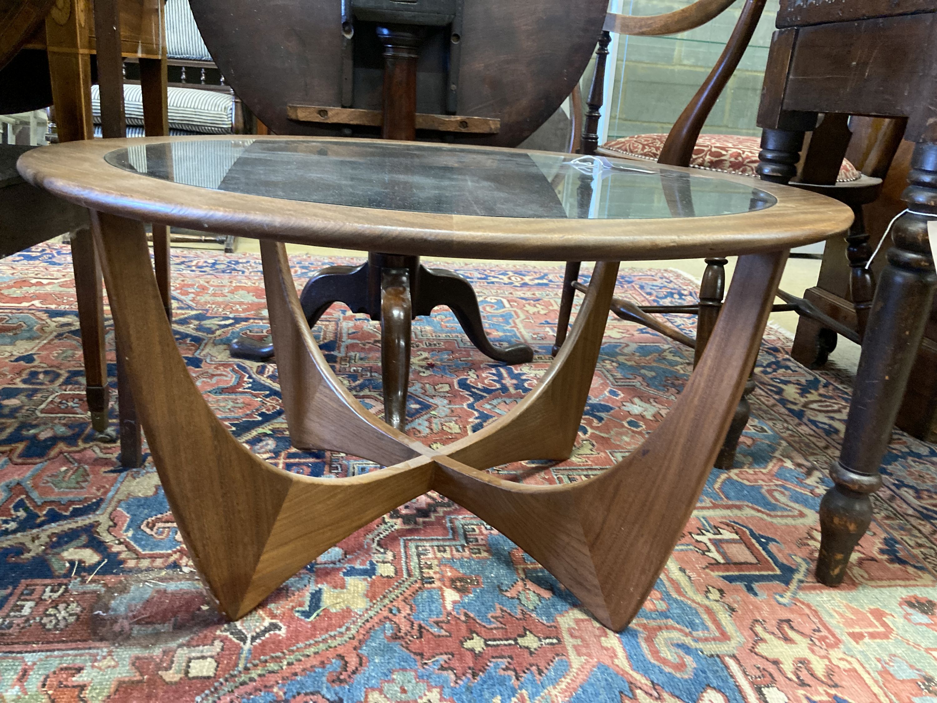 A G Plan circular glass top teak coffee table, diameter 84cm, height 45cm